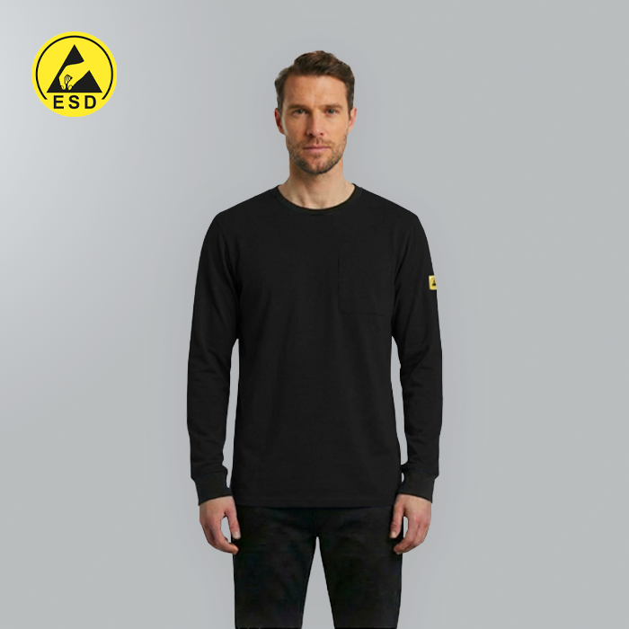 Man wearing a black long-sleeve shirt with ESD logo on a gray background