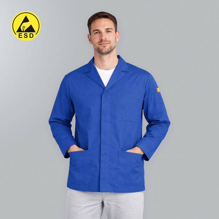 Man wearing a blue lab coat with ESD logo on a gray background