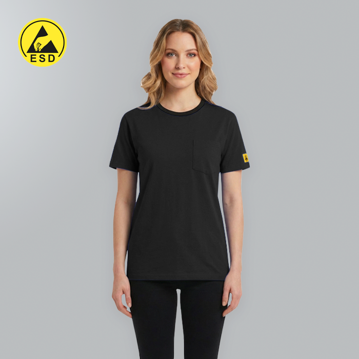 Woman wearing a black t-shirt with a yellow logo on a gray background