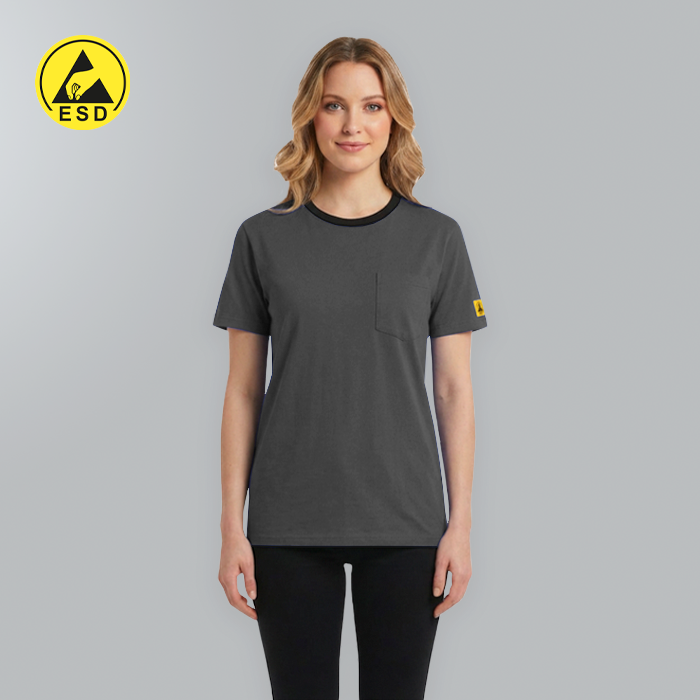 Woman wearing a gray t-shirt with a yellow logo on a gray background