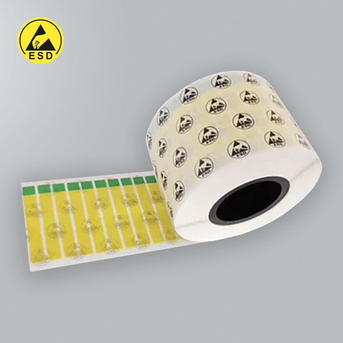 Roll of labels with ESD symbol on a gray background